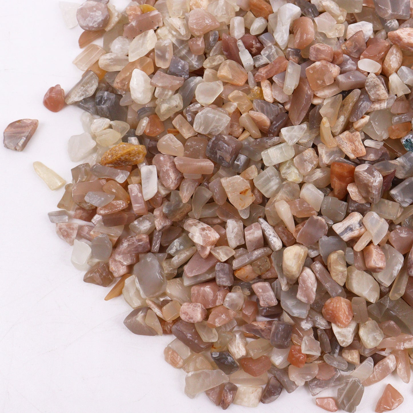 Natural moonstone gemstone chips in various shades of brown and beige by SGI Online SGI Online
