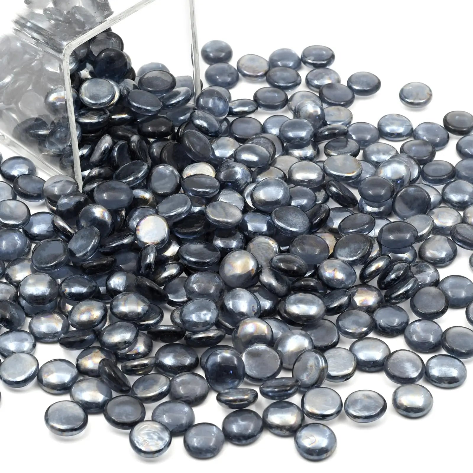 15kg grey glass pebbles scattered with some pouring from a clear container by STONED