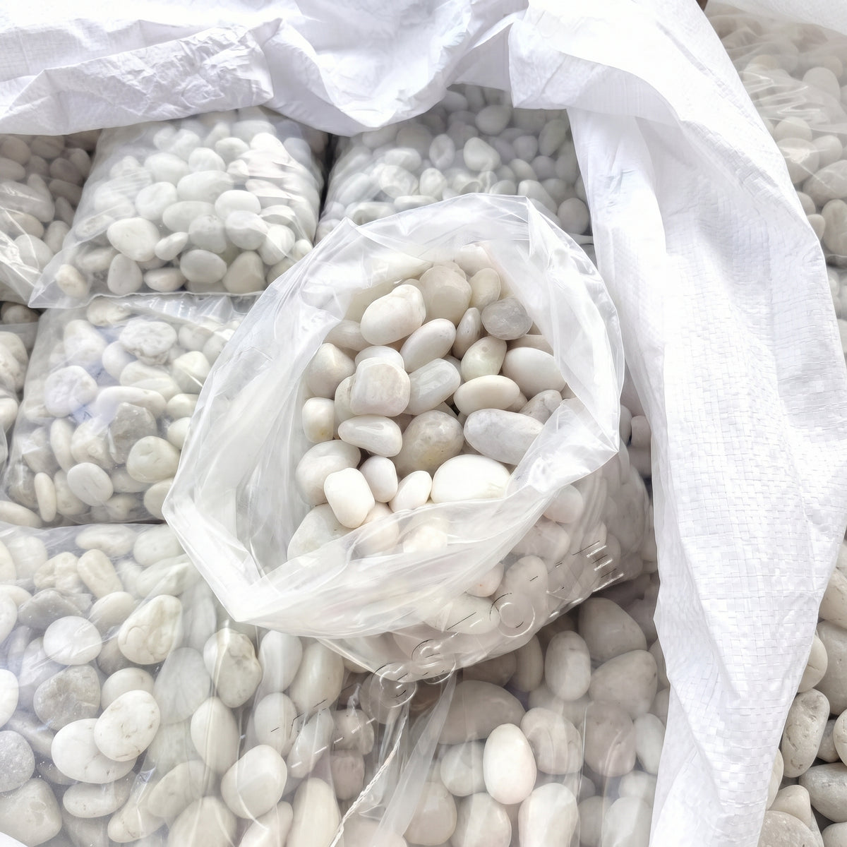 Off White Polished River Pebbles for Decor - SGI Online SGI Online