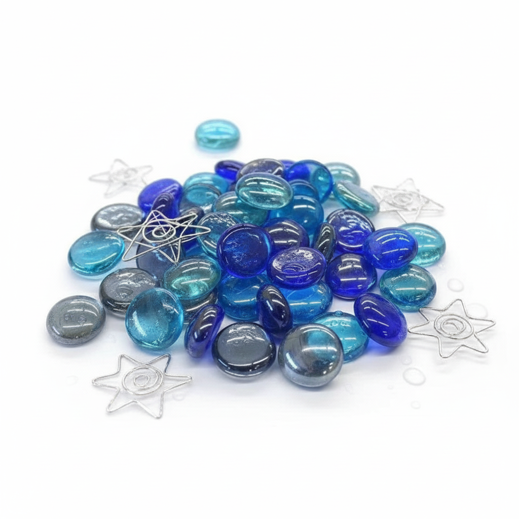 STONED blue and grey glass gems mixed with clear star-shaped glass pebbles on white SGI Online