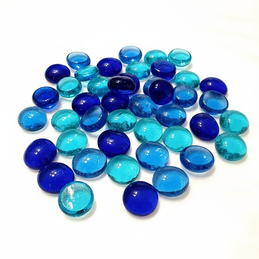 blue glass pebbles in varying shades of blue, smooth and glossy decorative pieces SGI Online