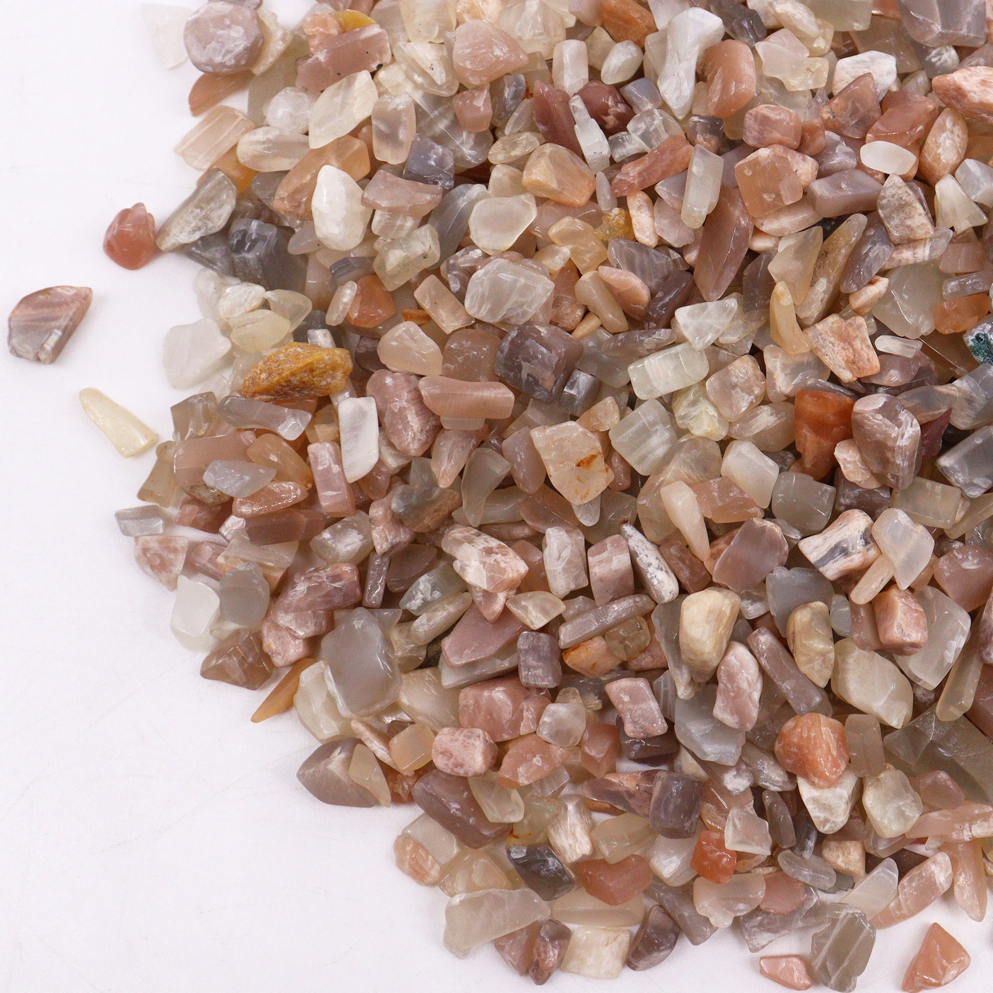 Natural moonstone gemstone chips in various shades of brown and beige by SGI Online