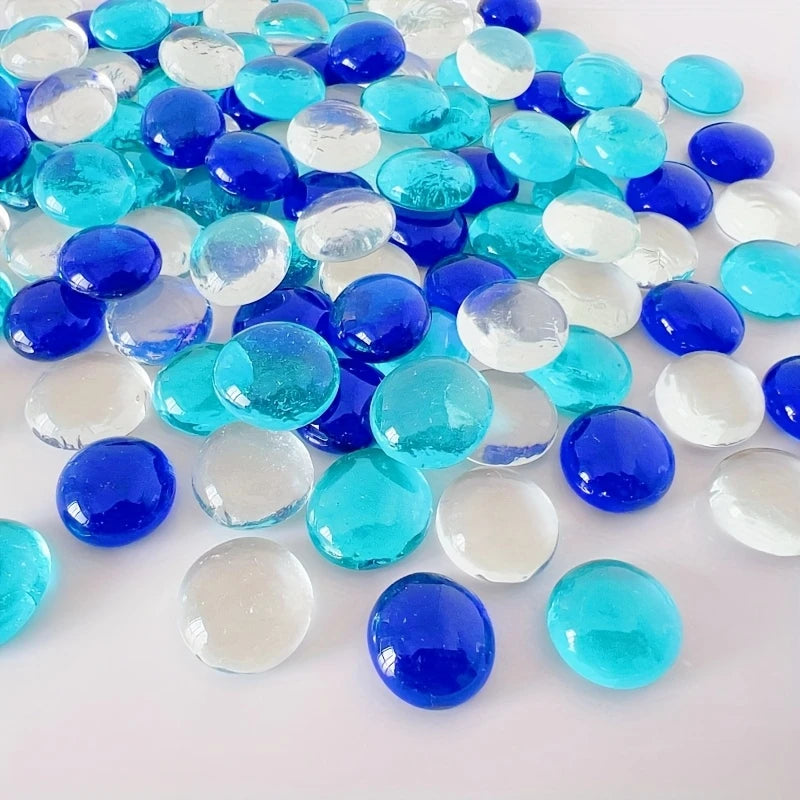 Decorative glass pebbles clear and blue with smooth rounded shapes for craft and decor projects