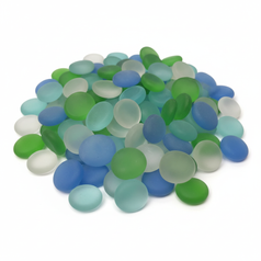 Assorted frosted mixed glass pebbles in blue green and white colors for decoration