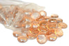 STONED 15kg peach glass pebbles spilling from a clear plastic bag with smooth round shapes