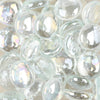 Close-up of STONED clear iridescent glass pebbles with smooth glossy surfaces reflecting light
