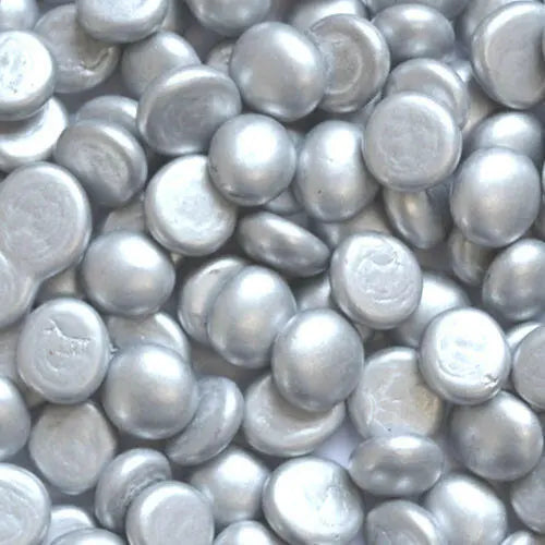 Close-up view of metallic silver glass pebbles by STONED for decorative and craft use SGI Online