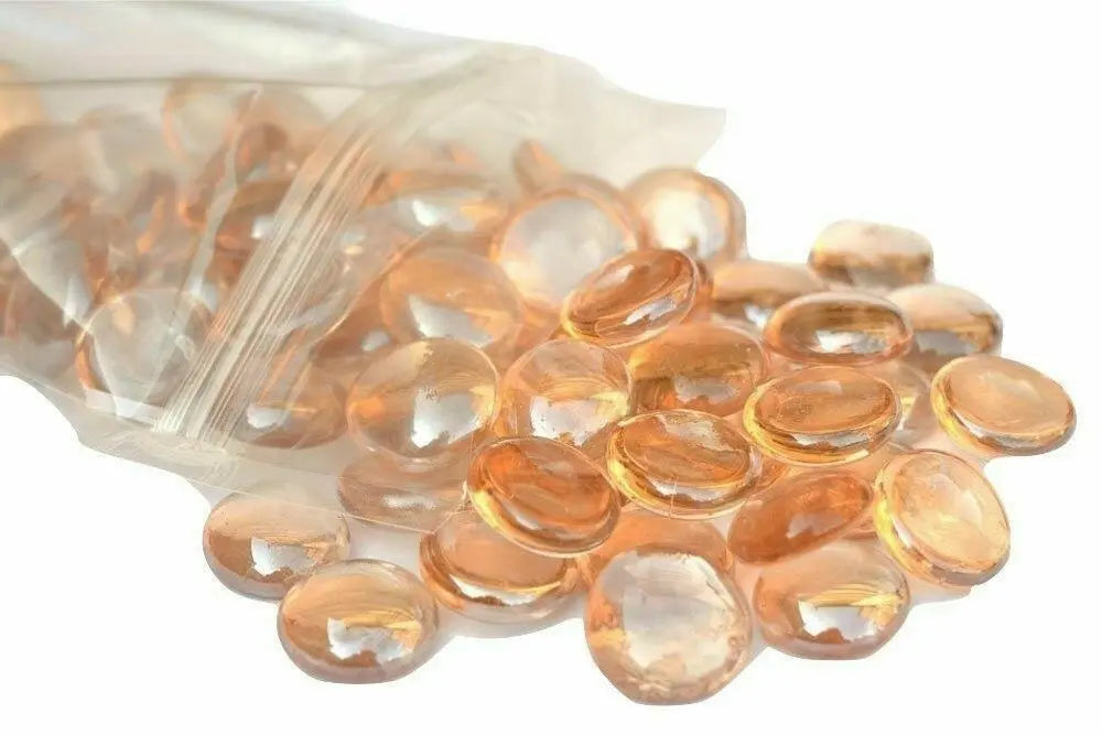 STONED peach glass pebbles scattered from clear resealable bag for decorative use