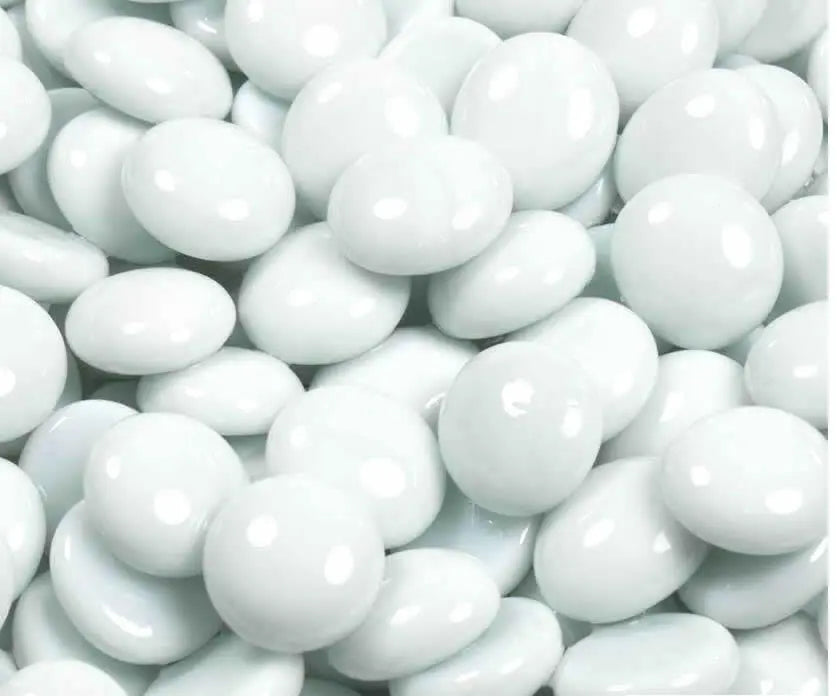 Close-up of STONED white glass pebbles with smooth and glossy finish for decoration SGI Online