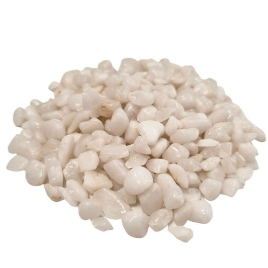 Pile of polished white quartz gemstone chips from SGI Online for jewelry and crafts SGI Online